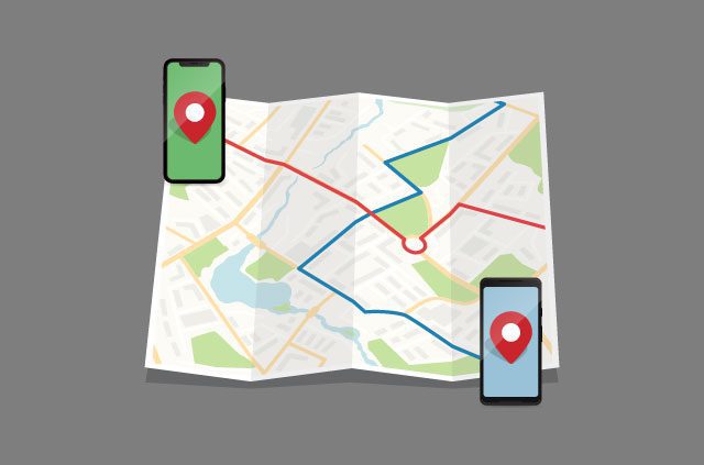 Two phones on a map with lines intersecting from them.