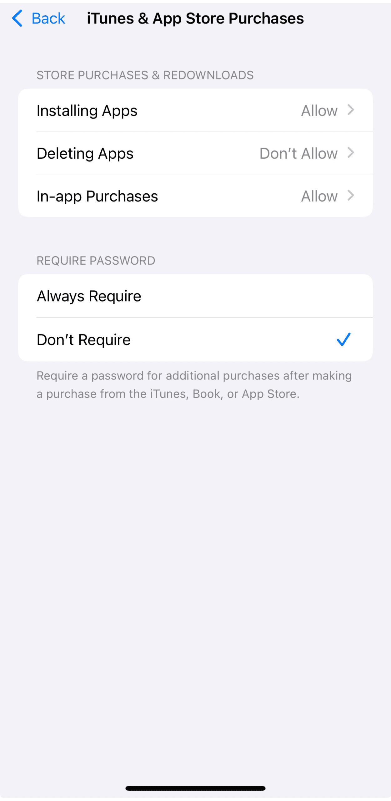 iTunes & App Store settings with app deletion disabled.