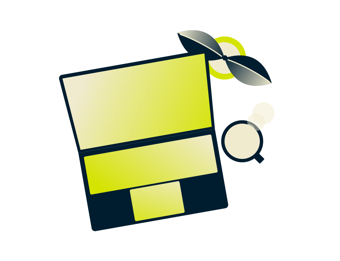 Ordenador portátil con una planta y una bebida.