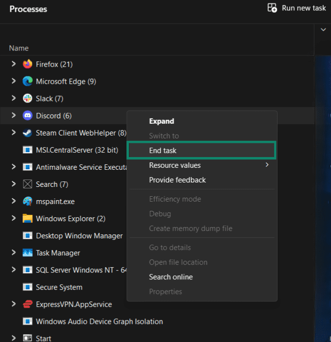 Windows 11 Task Manager right-click menu with End task highlighted.